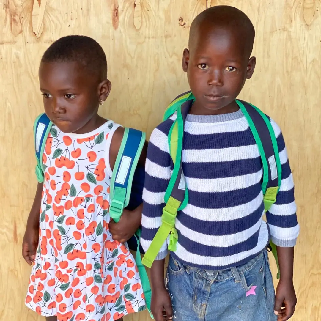 Safina and Clowi, orphans in Uganda participant in our fostering home.